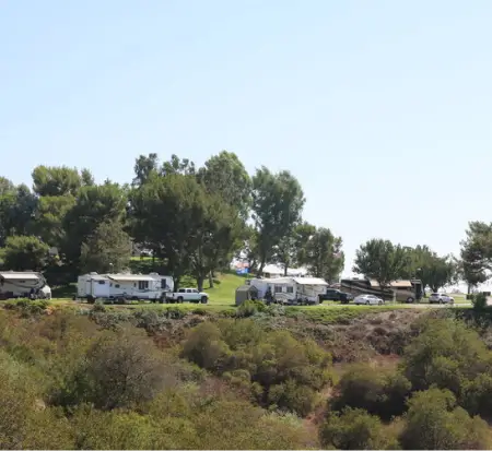 Campground with RVs parked among trees