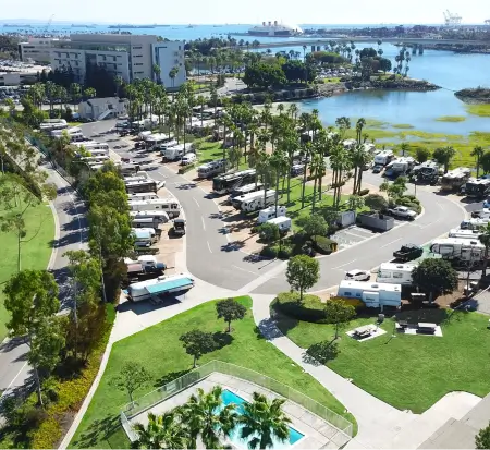 Aerial view of a coastal RV park with pool.