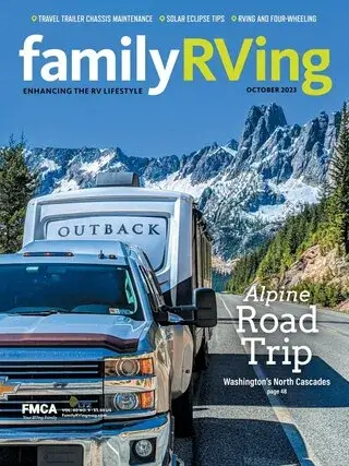 RV magazine cover featuring Alpine road trip theme