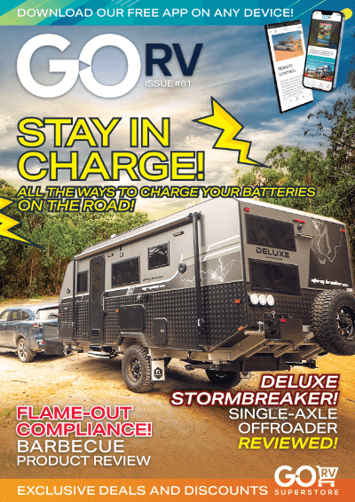 RV magazine cover promoting camping vehicle and mobile app.