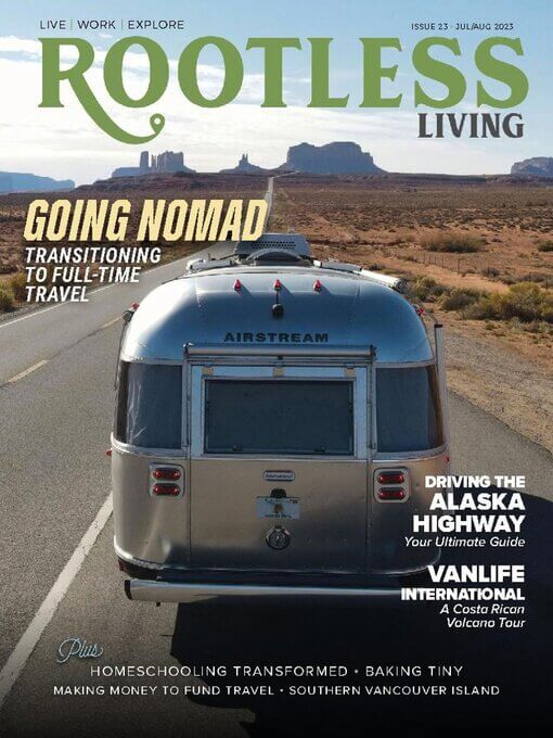 Airstream trailer on road, desert landscape, "Rootless Living" magazine cover.