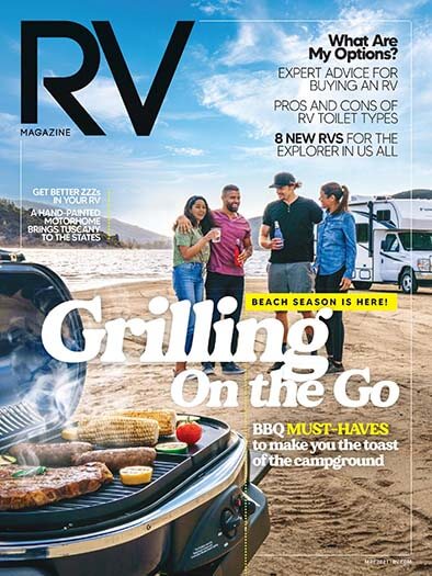 Friends enjoy beach BBQ near RV - RV Magazine cover.