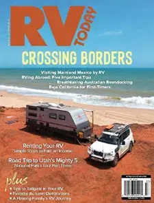 RV magazine cover, "Crossing Borders" issue, beach camping scene.