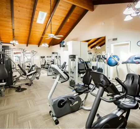 Well-equipped fitness center with various exercise machines.