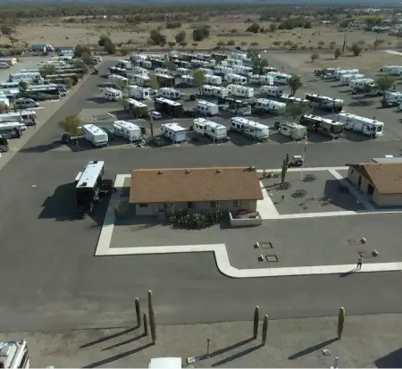 Aerial view of RV park with cacti and buildings