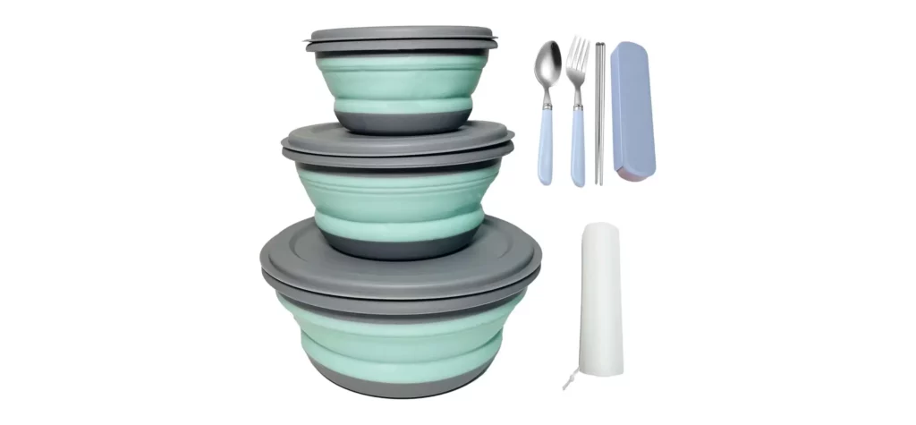Collapsible silicone bowls with utensils and a napkin.