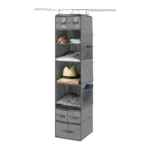 Hanging closet organizer with shelves and drawers.